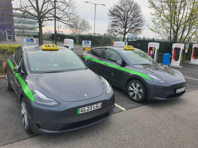 Cambridge Tesla Transfers vehicles at a Tesla supercharging location